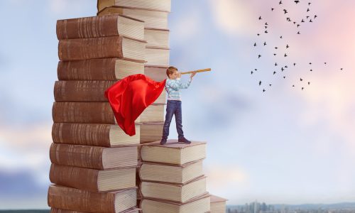 A school child with a telescope on the book staple discovers the world.